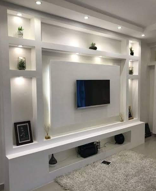 Luxury interior design services for a TV unit  by Affordable Residential Builders in Redhills