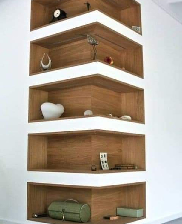 Modern interior wooden shelving crafted by Top Residential Builders in Karanodai