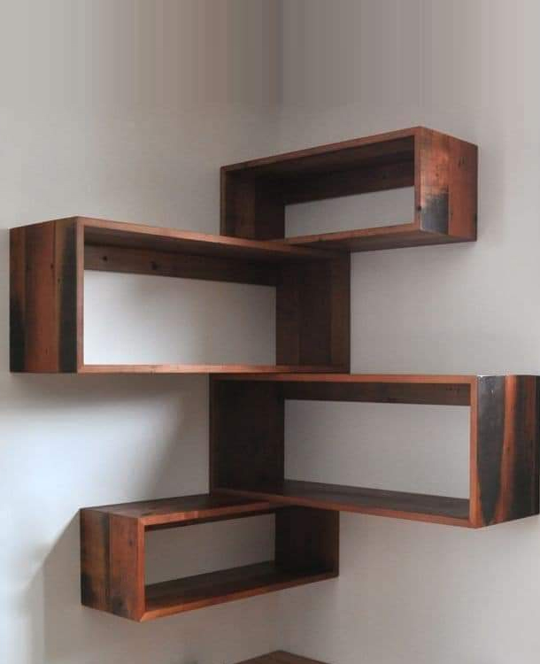 Elegant wooden shelf design for stylish home décor by KPR Builders Karanodai